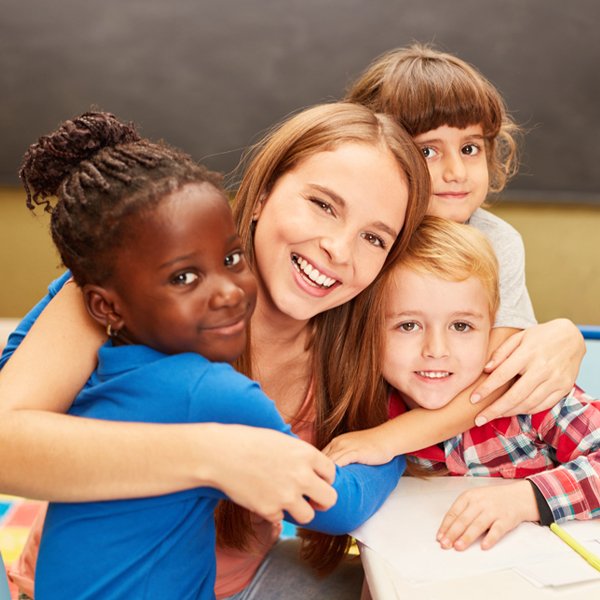 Three childreen with teacher