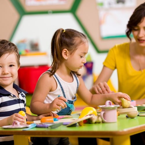 Teacher and two student doing lunch